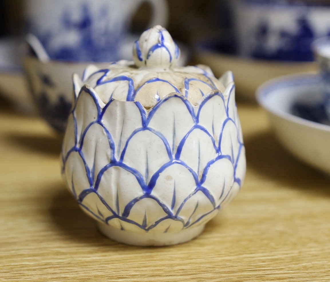 A large group of 18th century Worcester, Caughley and Liverpool blue and white tea bowls, coffee cups and saucers etc. including a Bow Cross-Legged Man